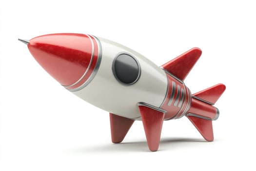 A retrostyle toy rocket isolated on white background photo