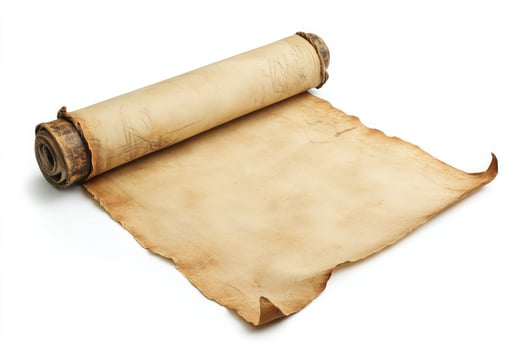 An old parchment scroll partially unrolled, revealing aged paper, isolated on white background photo