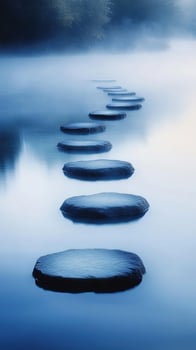Misty water reflects a stone pathway leading into a tranquil landscape creating peace and serenity photo