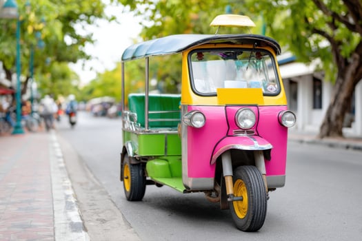 Colorful tuk-tuk waiting for passengers in Thailand photo