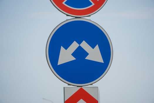 A blue and white traffic sign photo