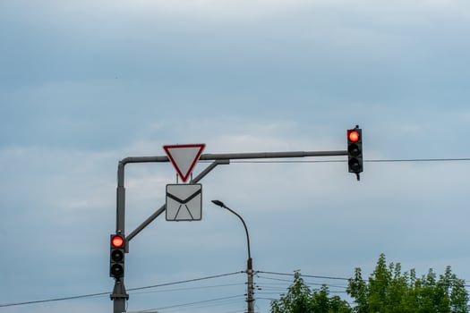 A traffic light with a red and white sign photo