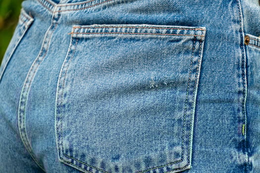 A woman's jeans with a pocket on the back photo