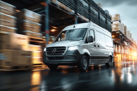The new mercedes - benz sprinter van is driving down a warehouse photo