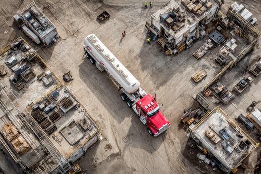 Aerial view of a large truck parked in a parking lot photo