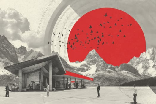 A red sun is in the sky over a mountain photo