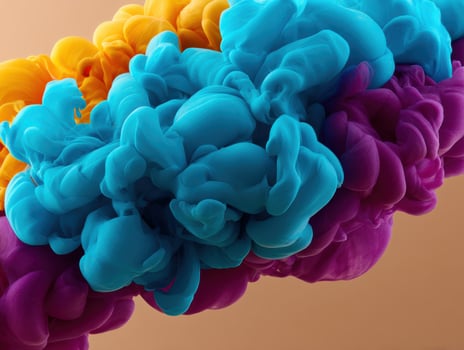 Colorful ink explosion with yellow, blue, and purple hues photo