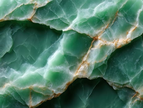 Green aventurine stone texture with golden veins photo