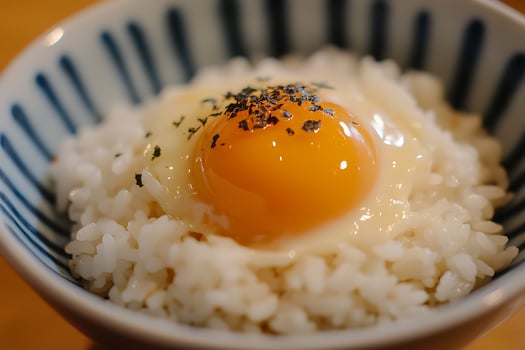 A Delicious Closeup of Rice Topped with a Perfectly Cooked Egg. photo