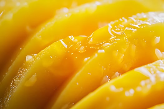 Juicy Slices of Fresh Mango with Water Droplets. photo