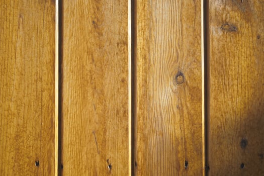 Wooden planks create a warm and rustic backdrop photo