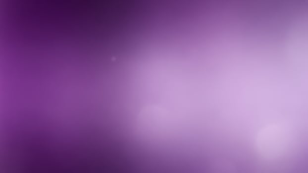 A purple background with a blurry image photo
