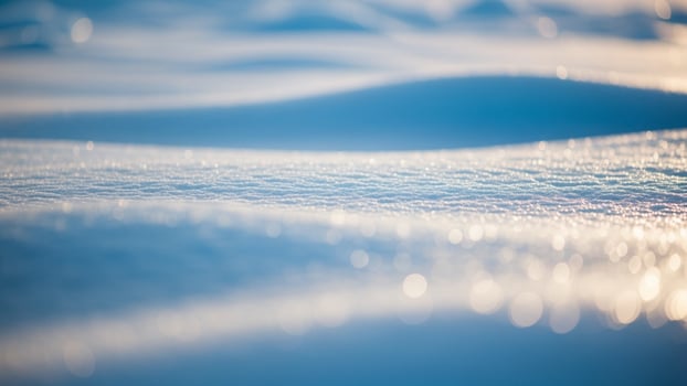 A close up of snow and water on a sunny day photo