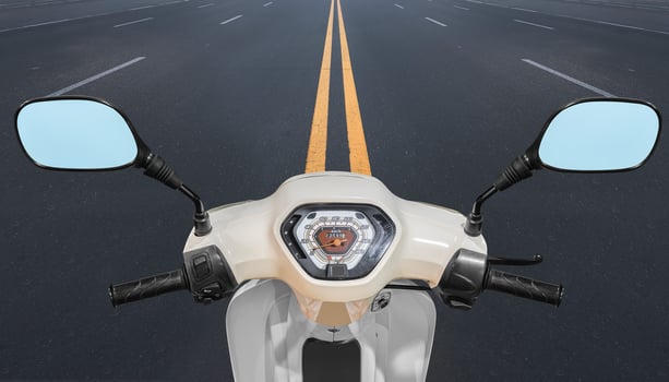 Handle bar motorcycle view with highway road view background photo