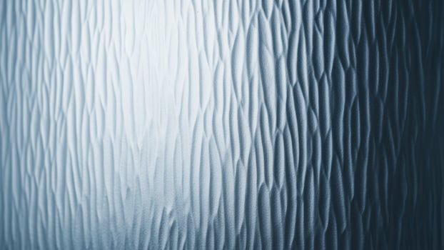 A blue wall with a wavy texture photo
