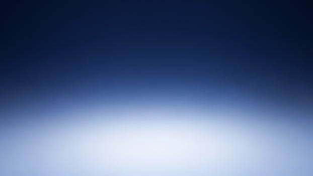 A blue light is shining on a dark background photo