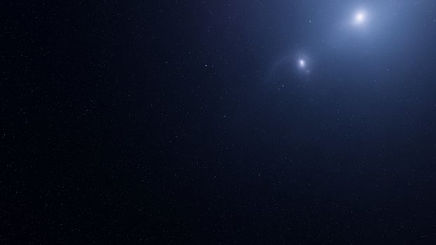A bright blue star in the night sky photo