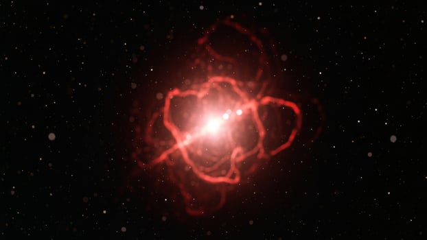 A red star in the sky with a black background photo