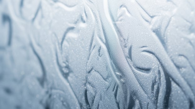 A close up of a frosted glass window photo
