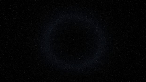 An image of a black hole in the sky photo