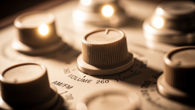 A close up of a knob on a vintage analog synthesizer photo