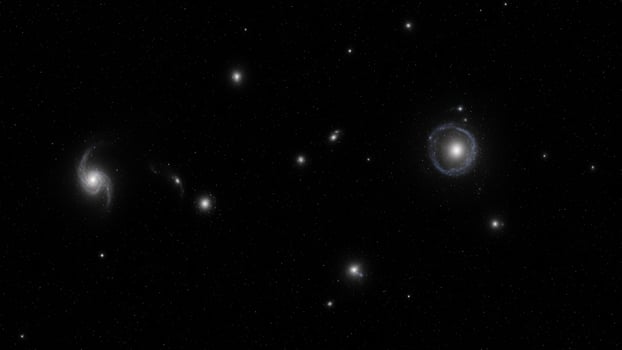 A group of galaxies in the dark sky photo