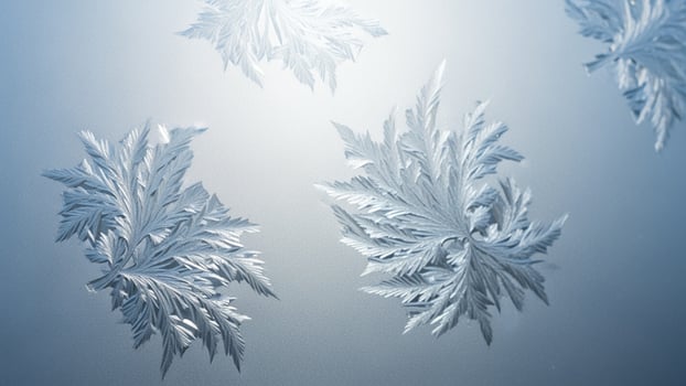Frosty glass with snowflakes on it photo