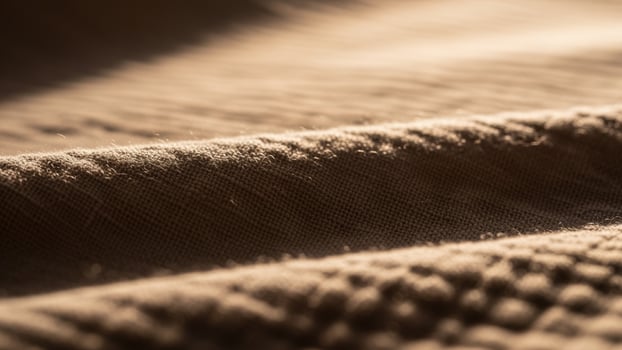 A close up of a fabric with a light source photo