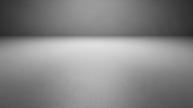 Black and white photo of a room with a white floor