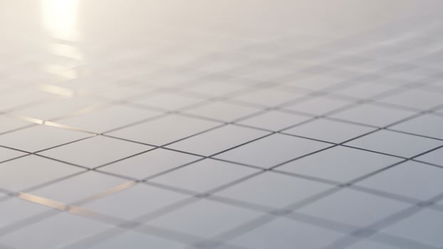 A grid of squares on a white surface photo