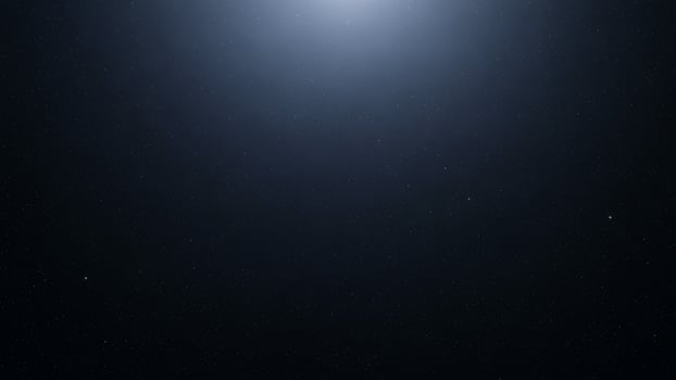 A bright light shining in the dark sky photo