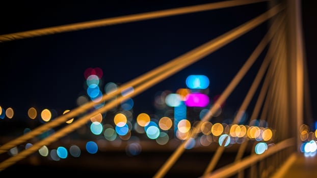 Abstract bokeh light on bridge at night photo