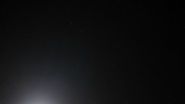 A bright light shining in the sky photo