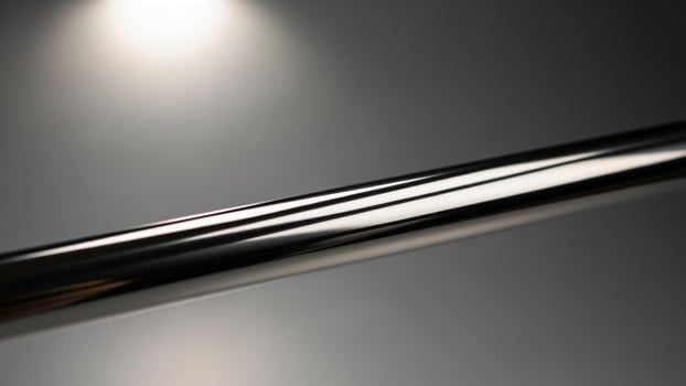 A close up of a metal rod on a gray background photo