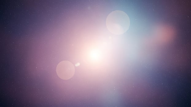 A bright light is shining in the dark sky photo