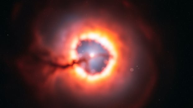 A black hole with a bright red and blue ring photo