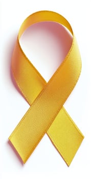A yellow ribbon is shown on a white background photo