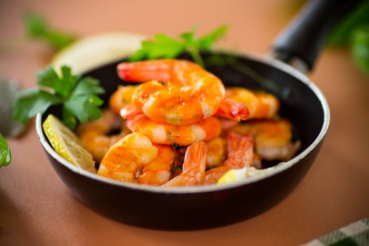 Golden fried shrimp with spices and fresh lemon photo