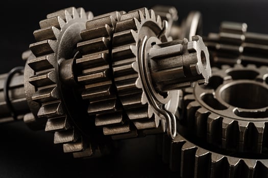 Gear and cogs wheels, clock mechanism, brass metal industrial. photo
