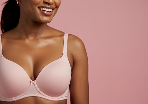 Smiling woman in bra for underwear catalog, advertising and fashion concept photo