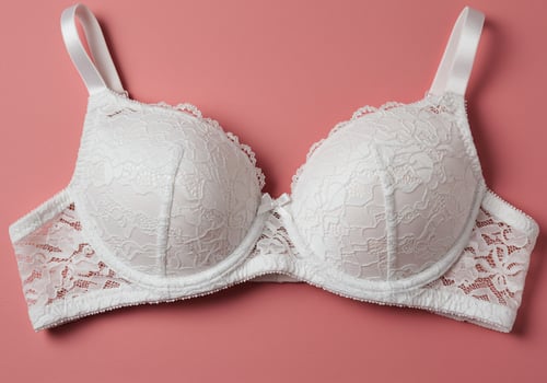 White lace bra on pink backdrop lingerie for women. For fashion, beauty use photo