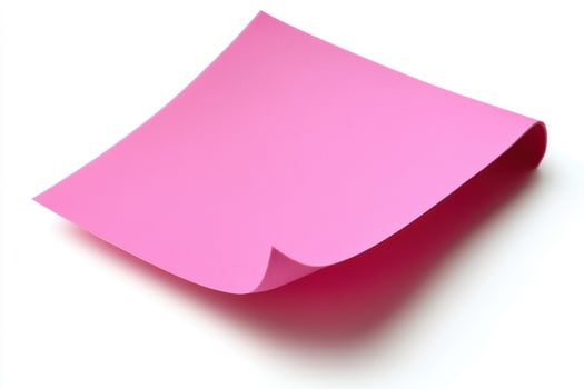 A single pink sticky note isolated on a white background, with a slight curl on one corner photo