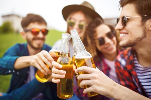 Group of friends enjoying party.people are drinking beer and laughing . photo