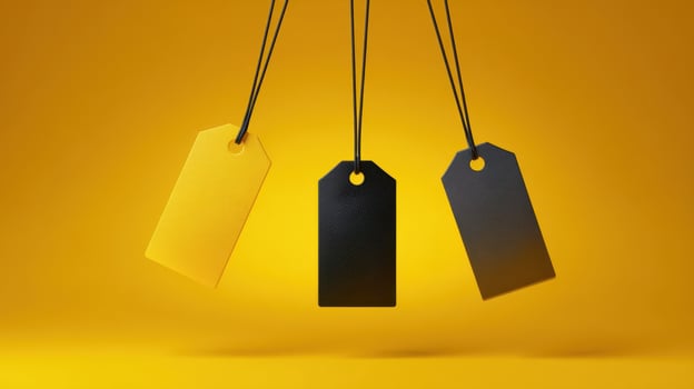The collection of colorful tags against a vibrant yellow background. photo