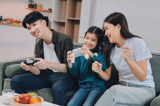 Asian family playing games together photo