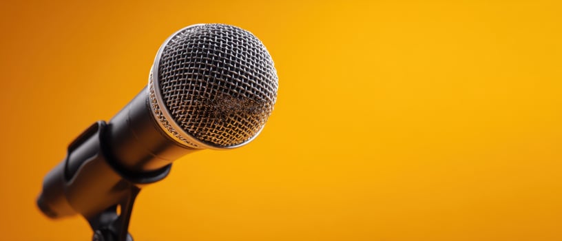 The microphone stands ready for inspiring performances against a vibrant background. photo