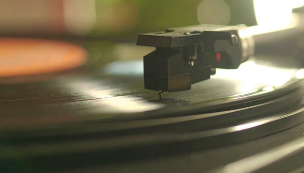 Turntable playing Vinyl Record, Close Up photo