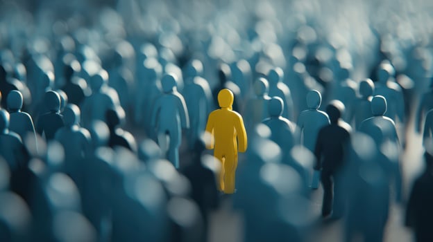 The Yellow Figure Standing Out in a Sea of Blue People photo