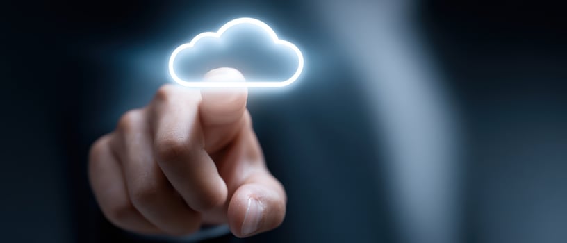 The Hand Reaching for a Digital Cloud in a Modern Business Environment photo