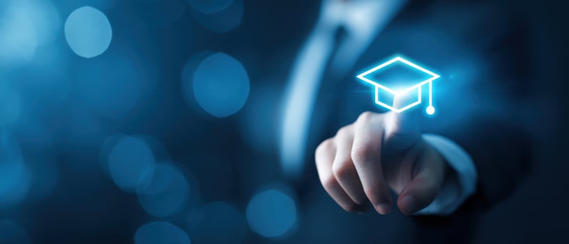 The hand reaching for the graduation cap symbol in a digital environment. photo